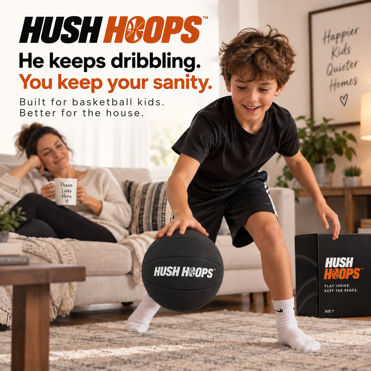 A child dribbling a black Hush Hoops basketball while his mom relaxes on the couch.